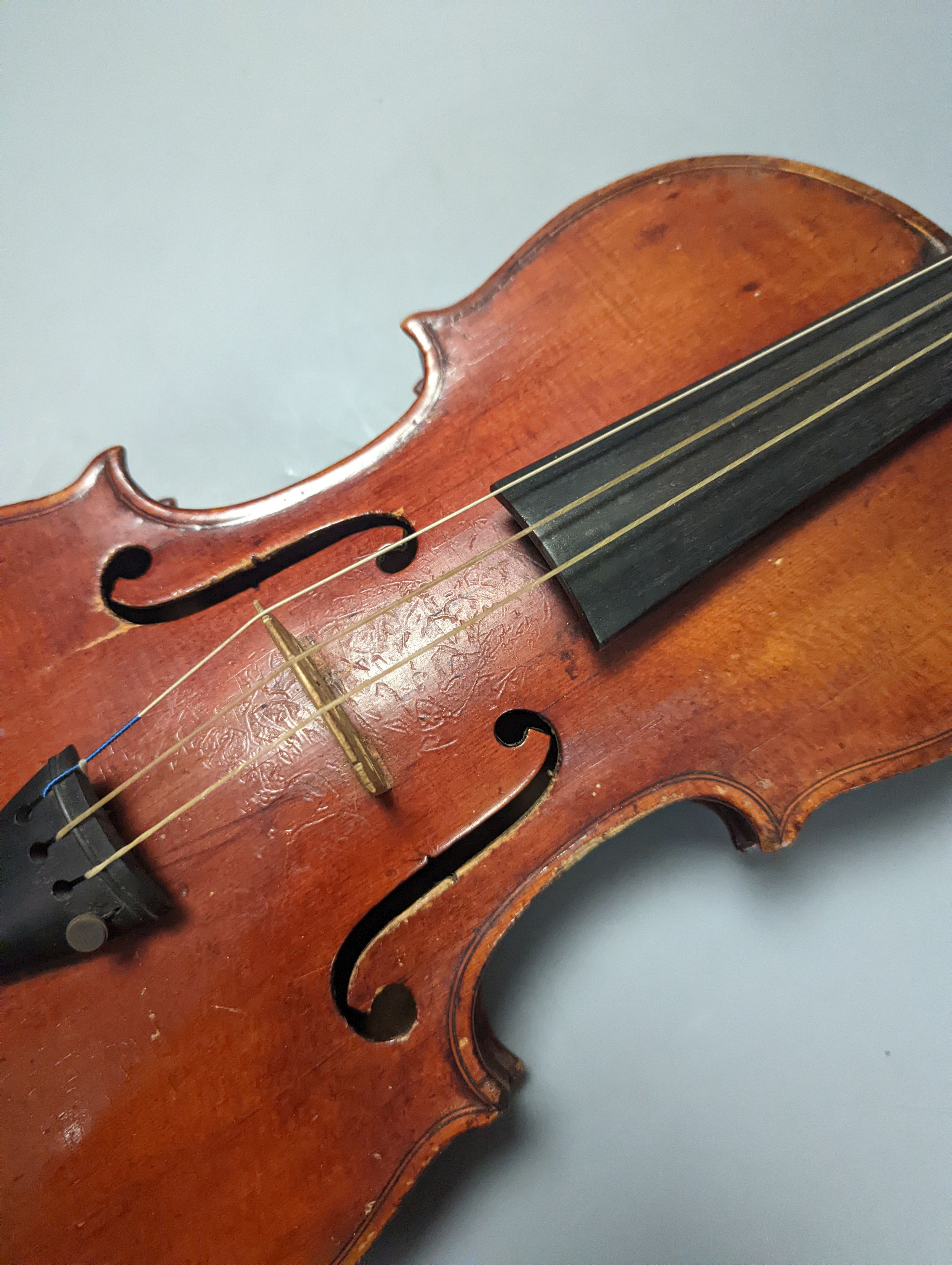 A violin in a mahogany case, case makers, Withers and sons, case 79 cms high.